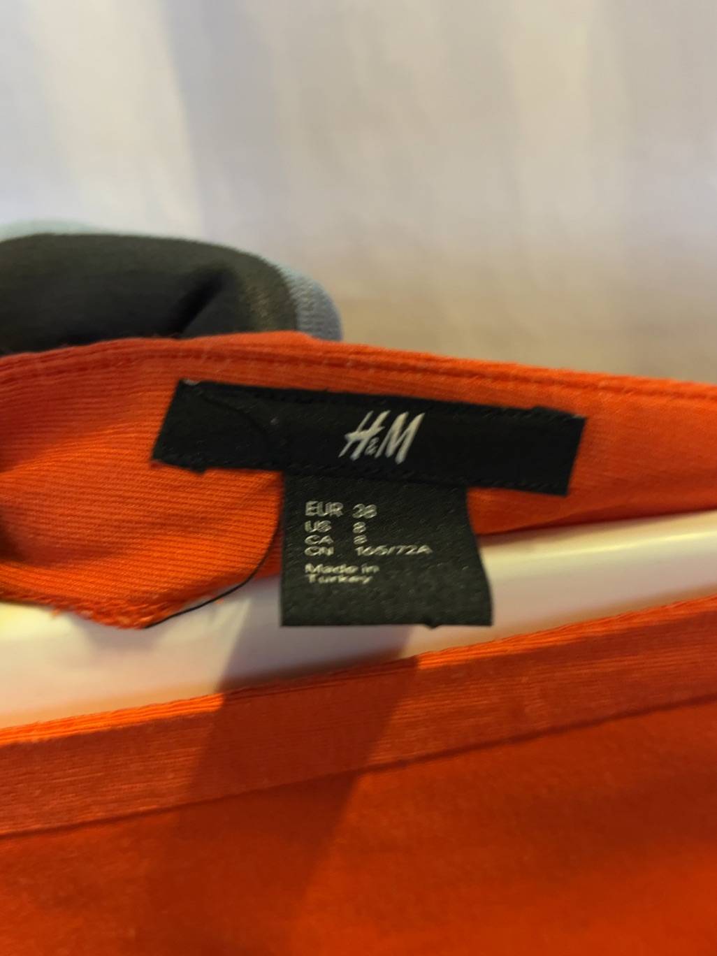 H&M orange minikjol med fickor