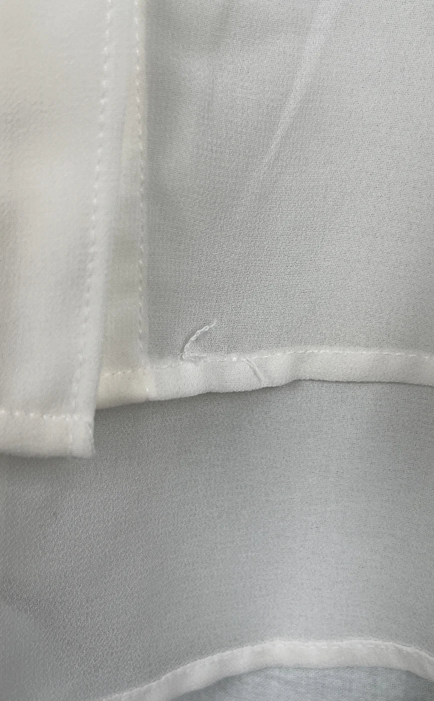 H&M ärmlös genomskinlig blus med knappar