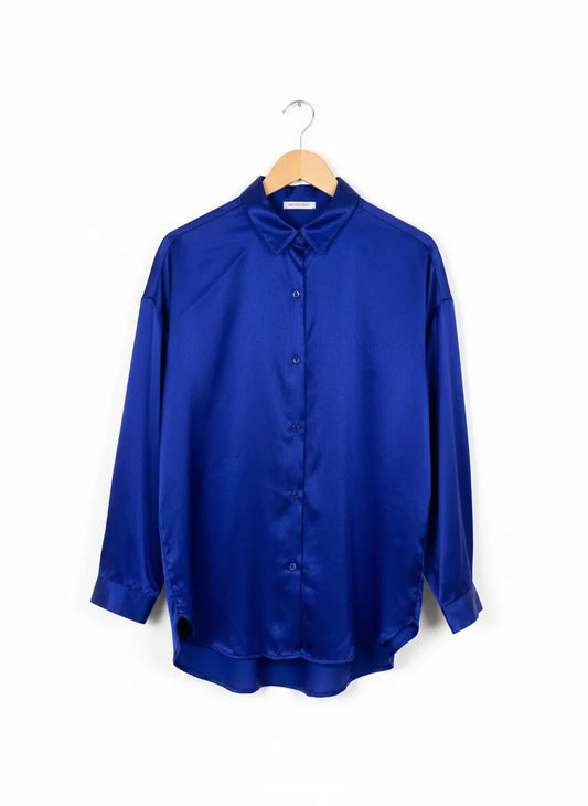 H&M blå satinblus med knappar