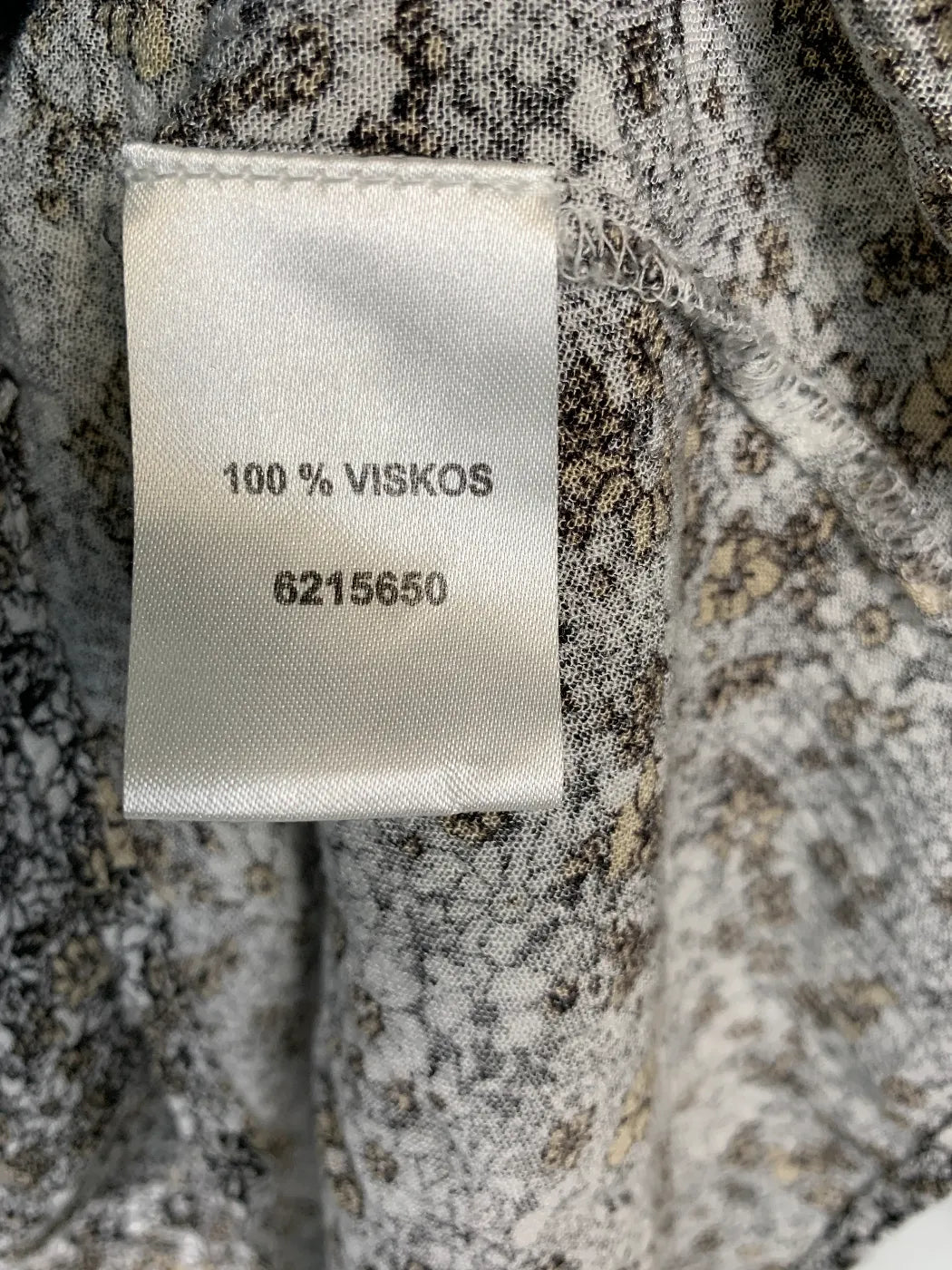 Lös blus med blommönster