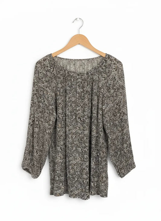 Lös blus med blommönster